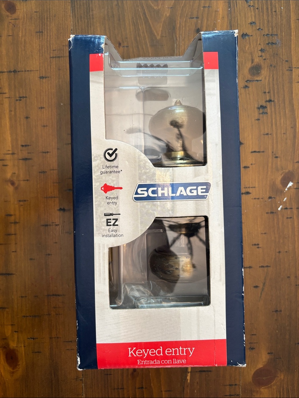 Schlage Keyed Entry Door Knob in Aged Brass